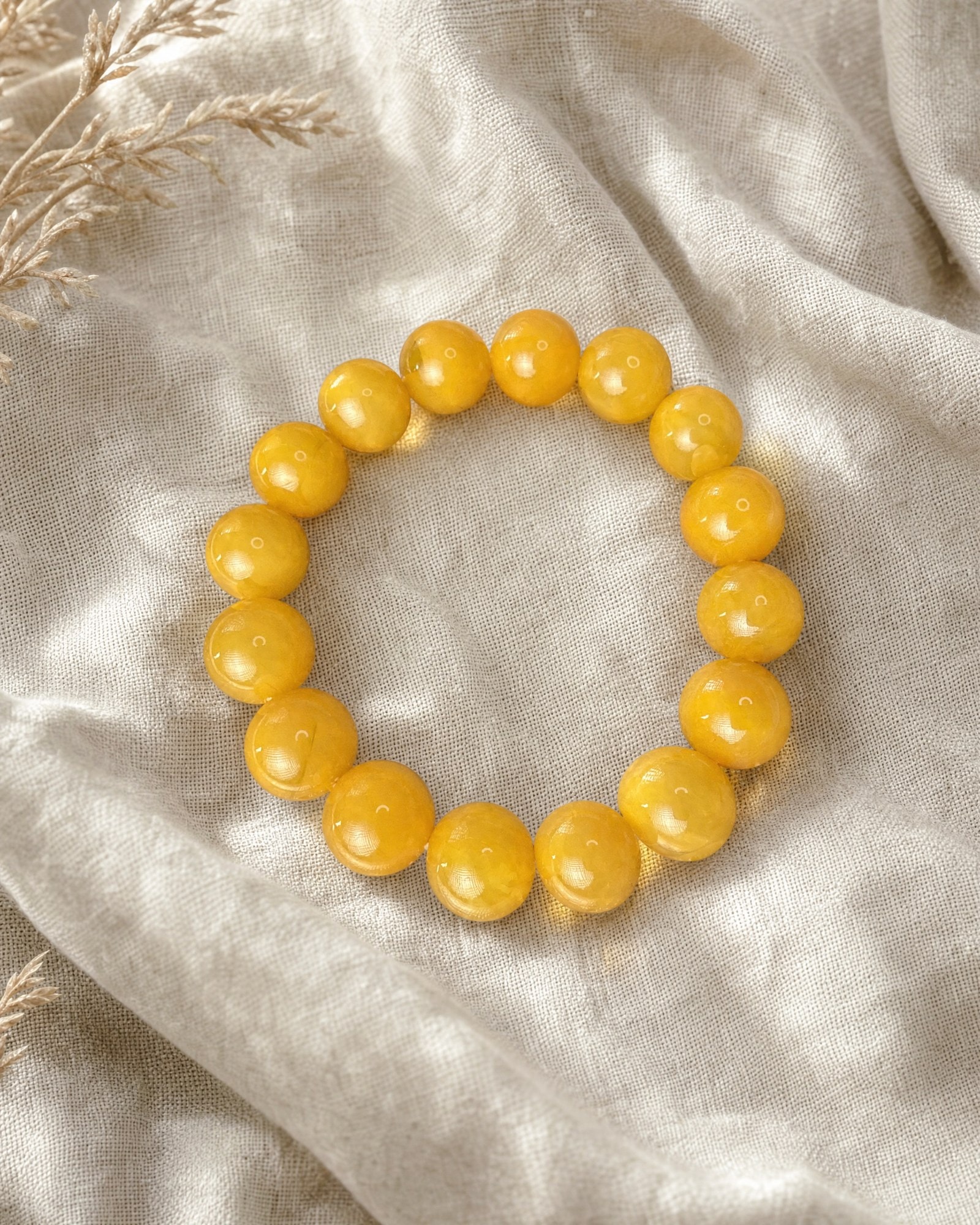 Armband Vasara · Eigelber Butterscotch-Bernstein